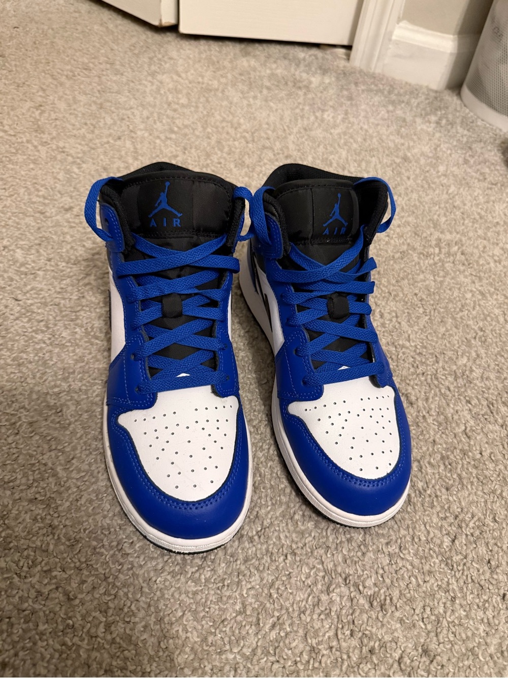 Air Jordan 1 Big Kids Mid Royal Blue, White and Black Sneakers